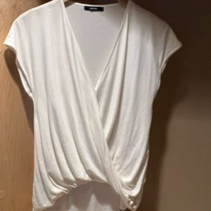 Funktional crossover cream top in size large.